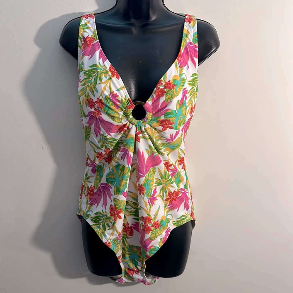 Into the blue XL white tropical print one piece swim suit. Not worn